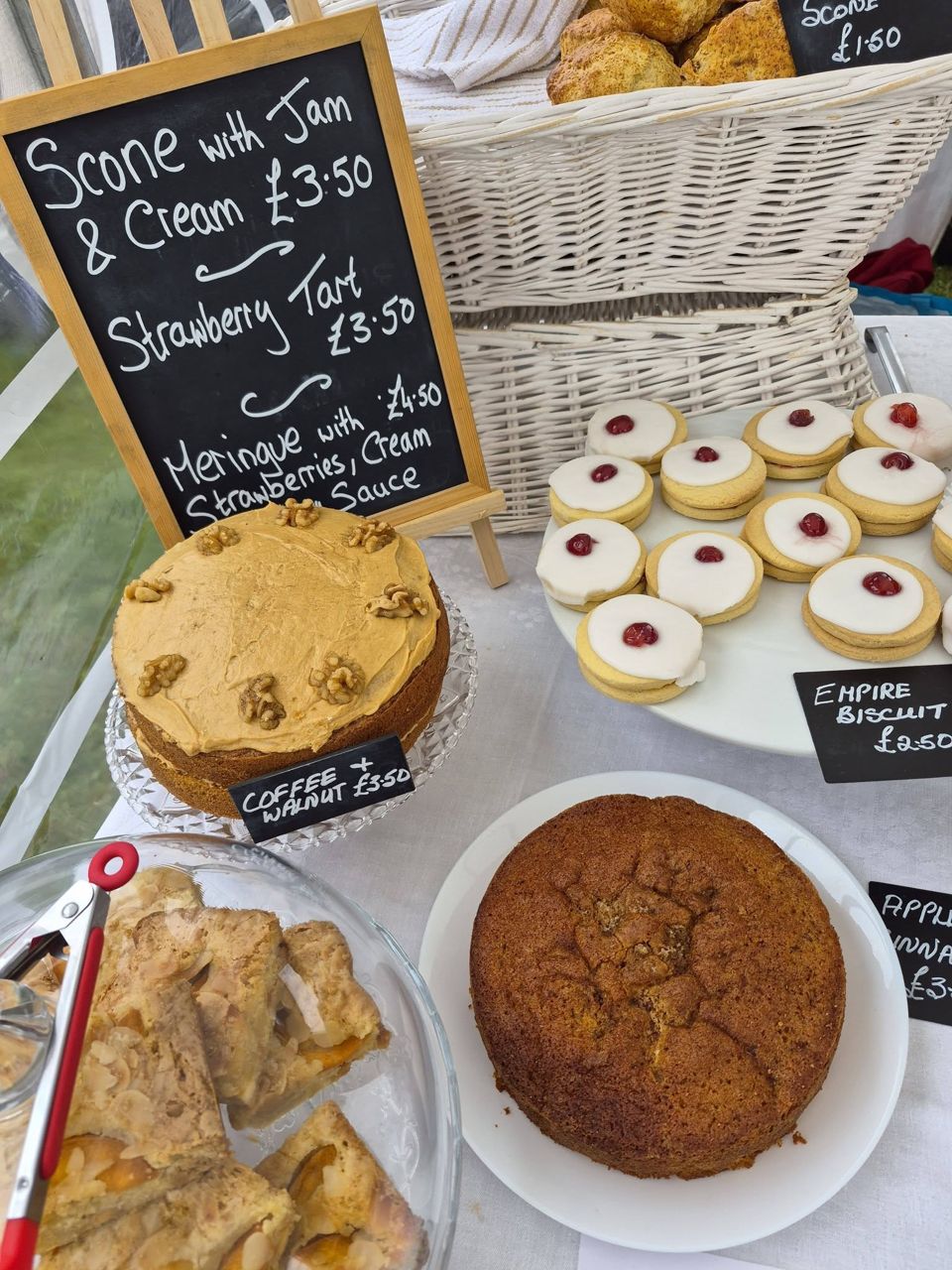 Scones, tarts and cakes with chalkboard labels