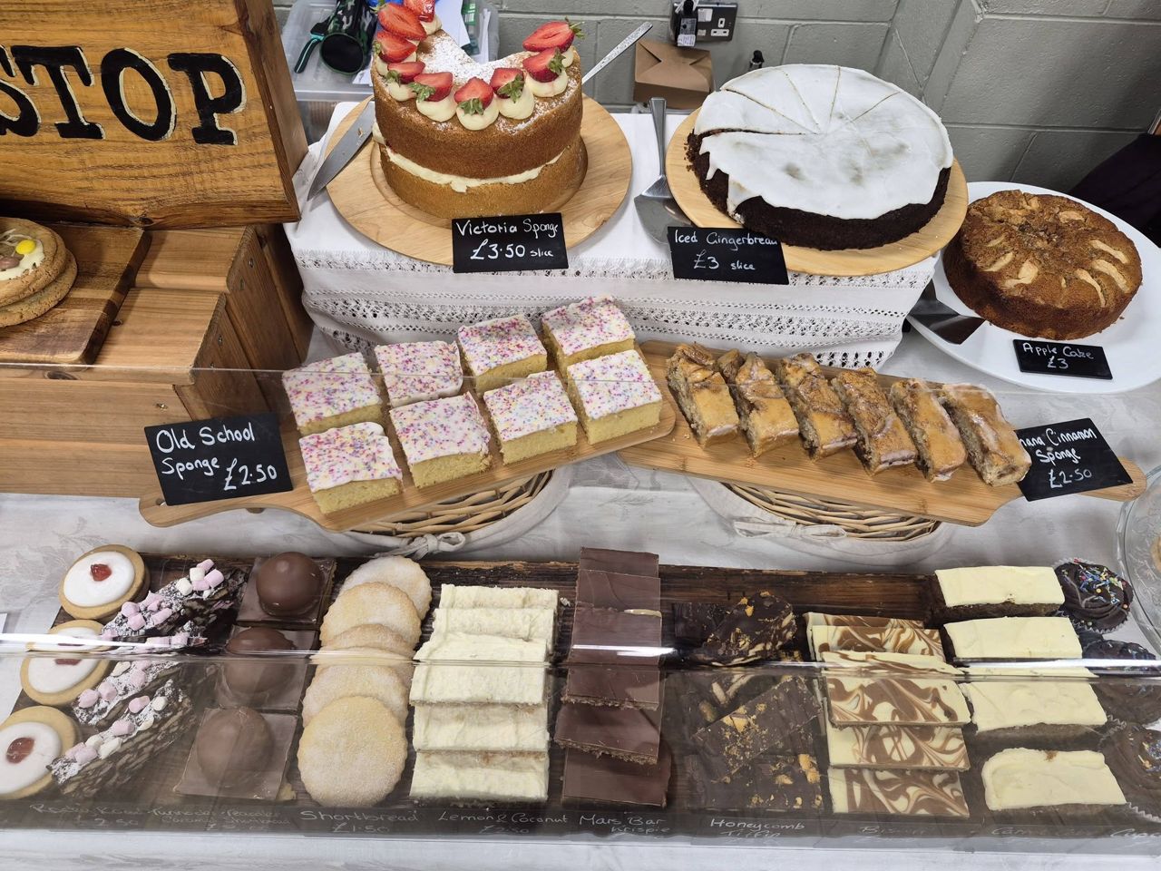 The Wee Cake Stop stall laid out with cakes, tray bakes and biscuits