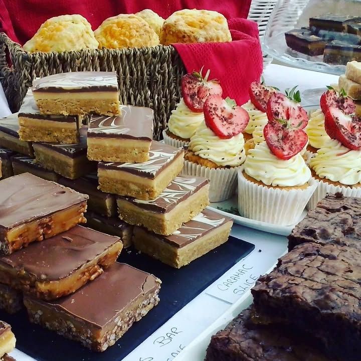 Tray bakes, caramel shortbread and strawberry cupcakes on the stall